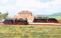 DR, steam locomotive with tender 55 7254, black/red livery, ep. III