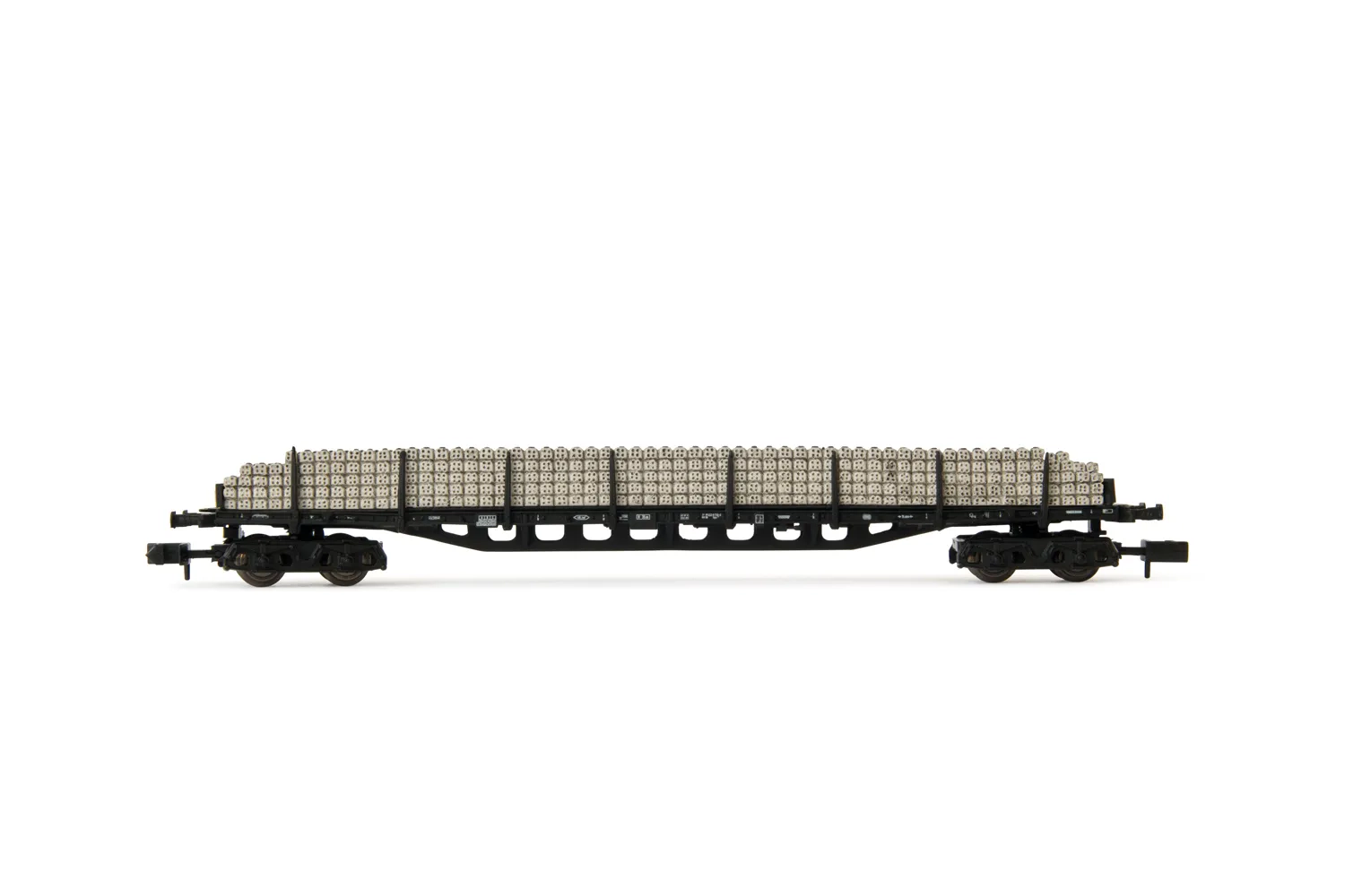 DB, 4-axle flat wagon with stakes Sgjs 716, black livery, loaded with concrete sleepers, period IV