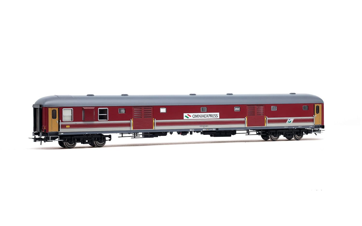 FS, luggage van UIC-X 1970 without skirts, red/grey livery, "Omnia Express"
