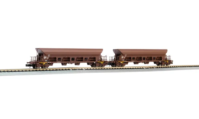 DR, 2-unit set 4-axle hopper wagons Facs, brown livery, loaded with brown coal, period IV