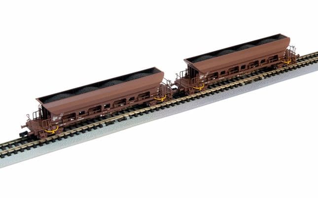 DR, 2-unit set 4-axle hopper wagons Facs, brown livery, loaded with brown coal, period IV